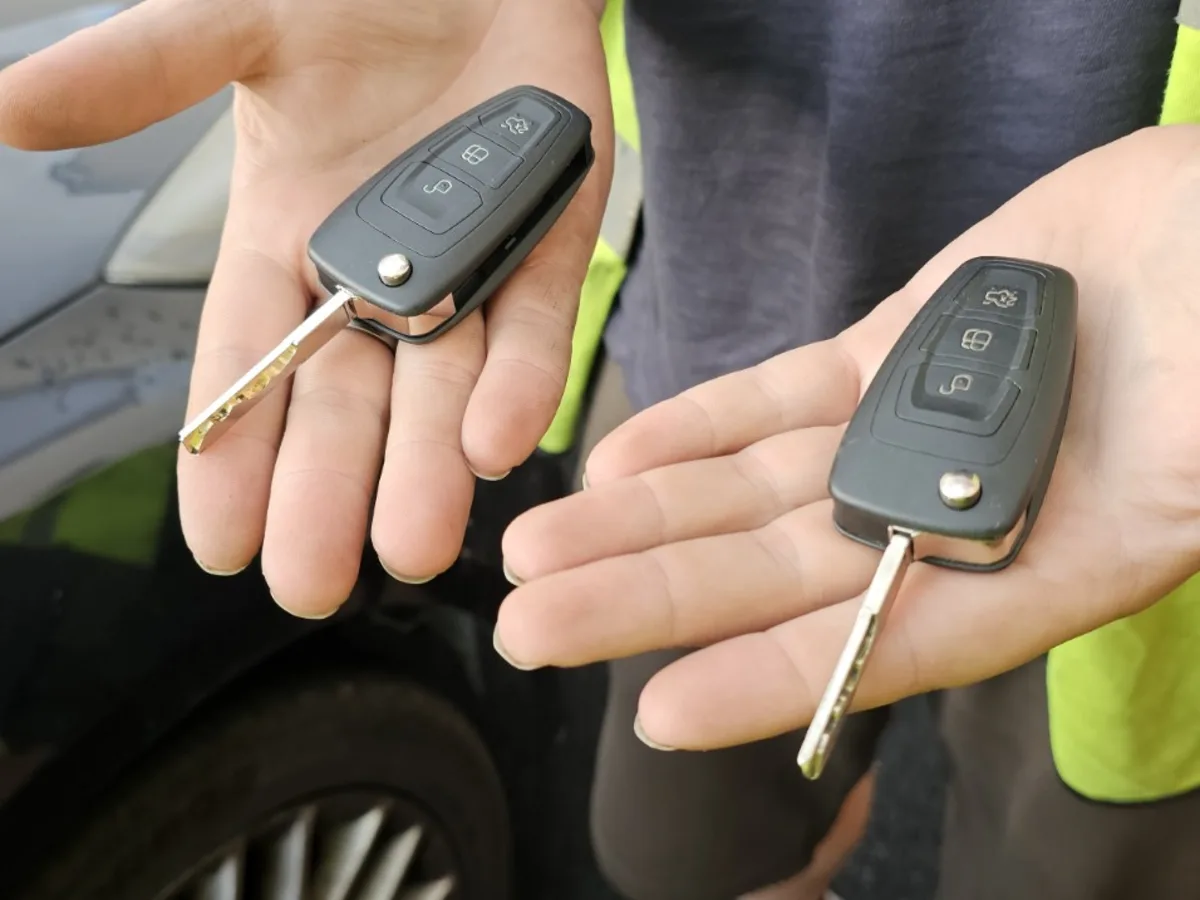 Original Ford key beside a newly cut and programmed key