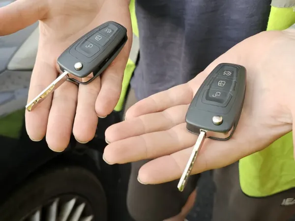 Original Ford key beside a newly cut and programmed replacement key in Hereford